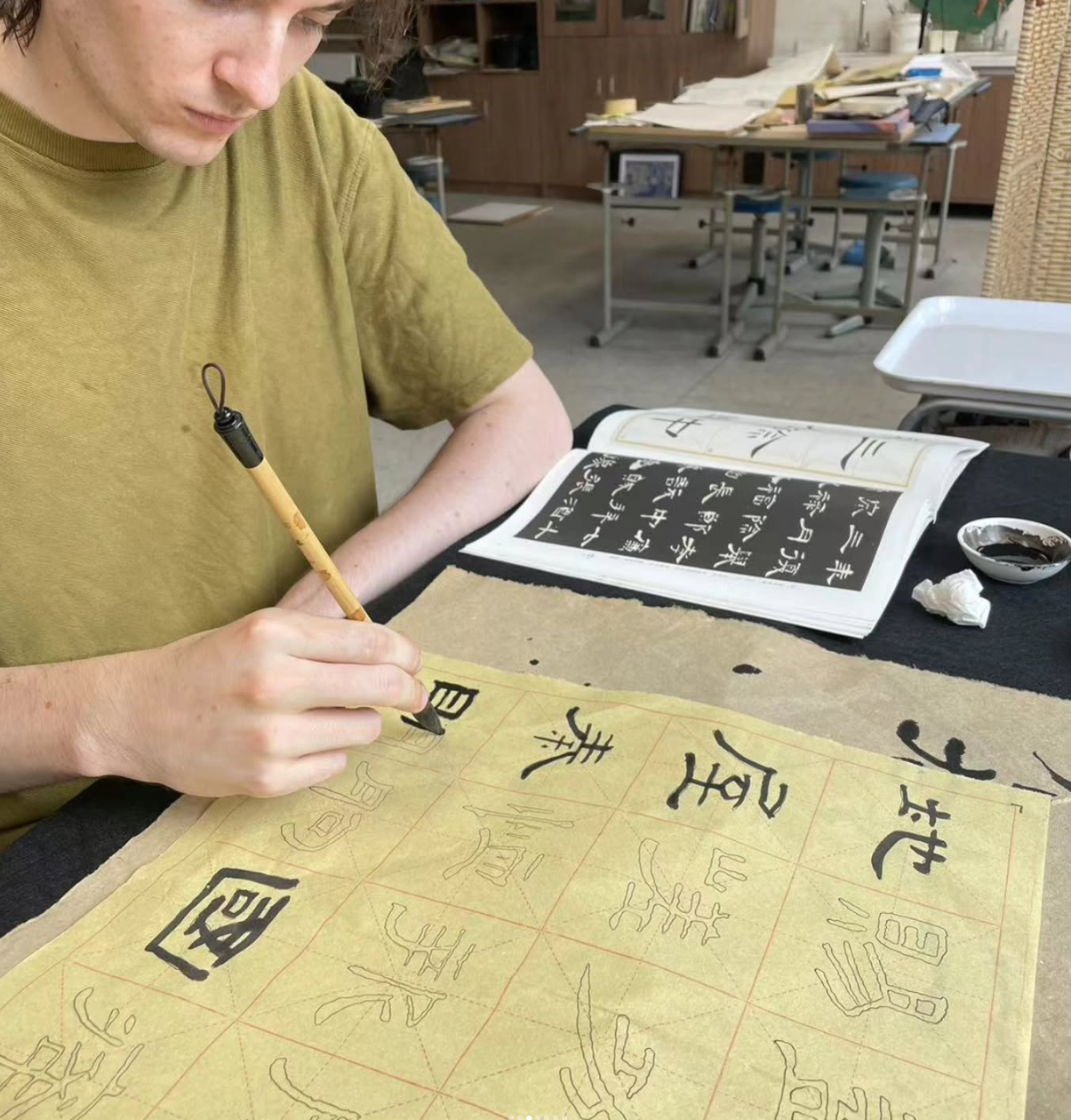 Offered calligraphy lessons by the school art teacher