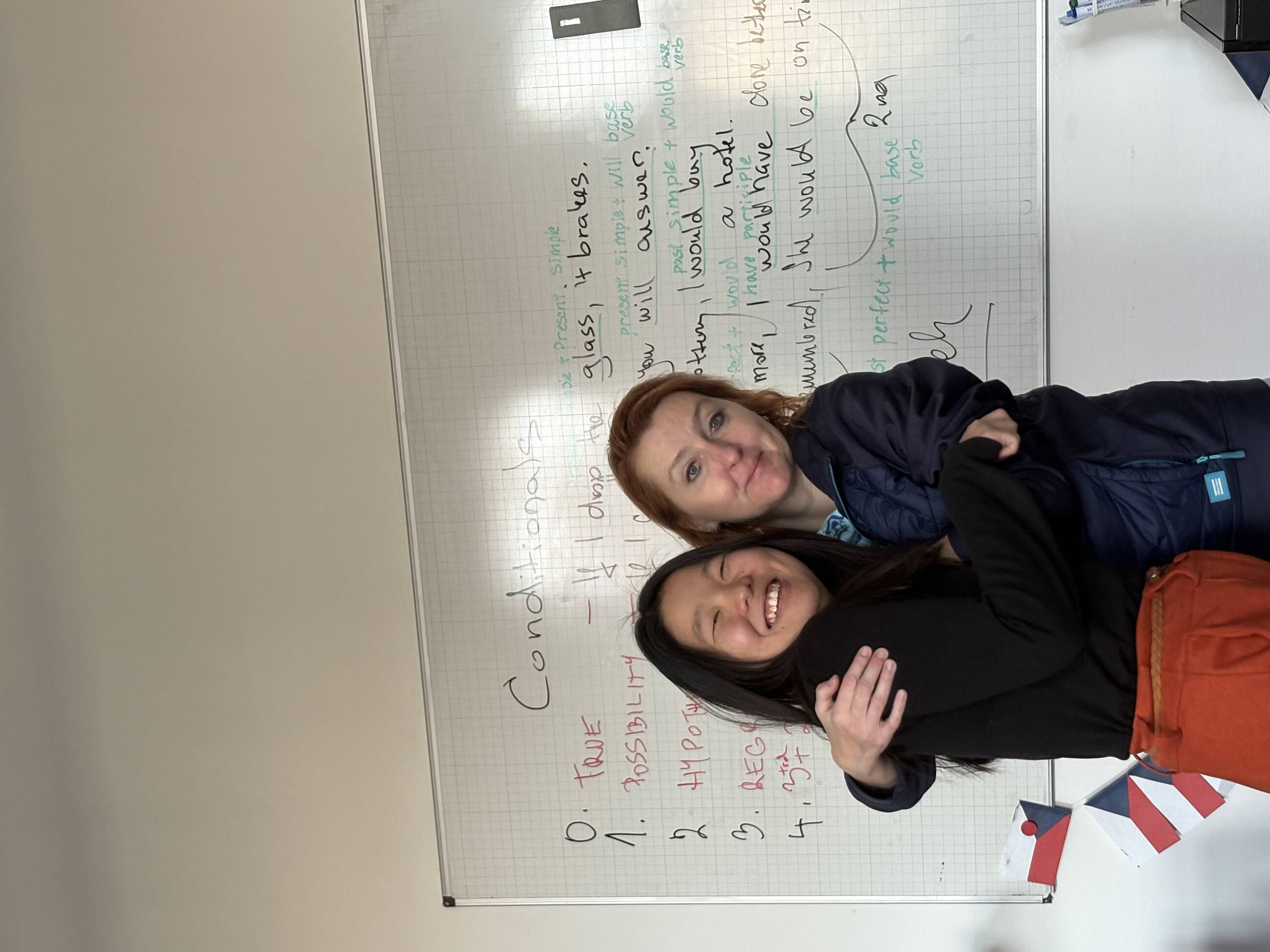 2 classmates celebrating conditionals 