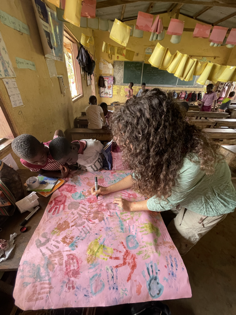 Making a poster with all the hands of the students in the class.