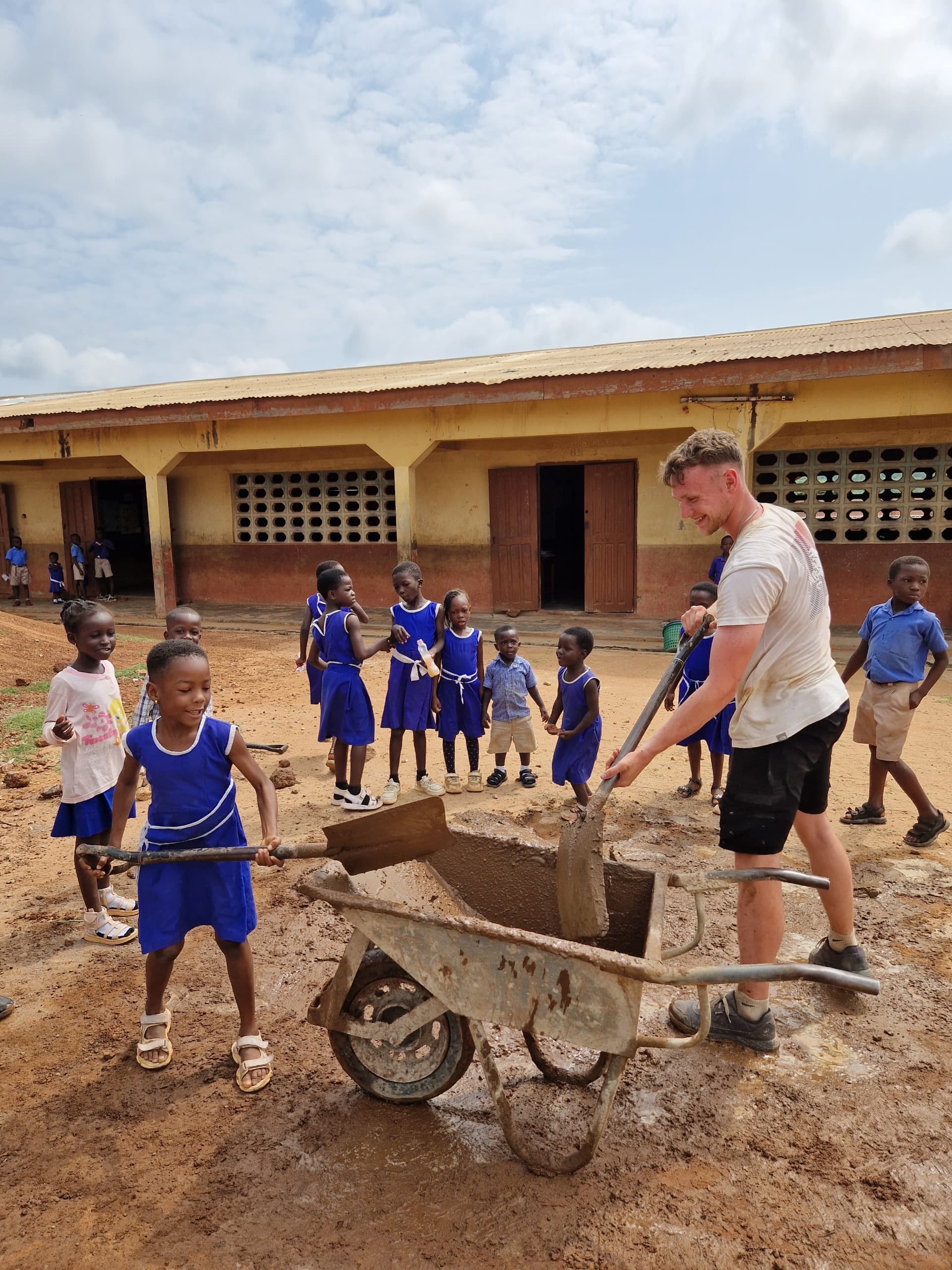 Some of the children helping me build their new school!
