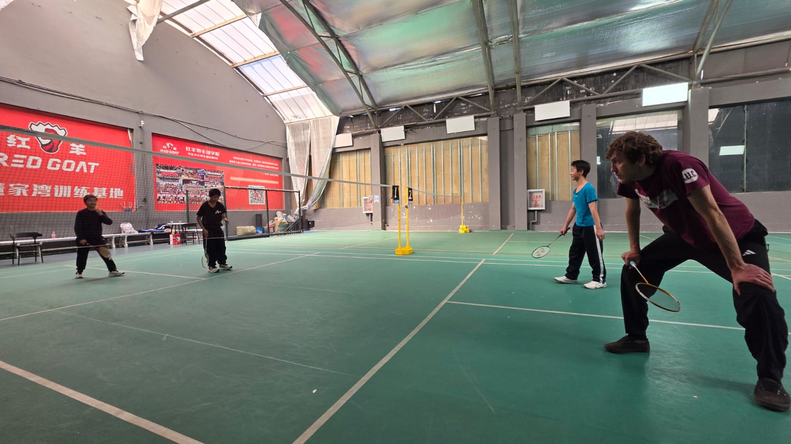 Me playing badminton with some locals 