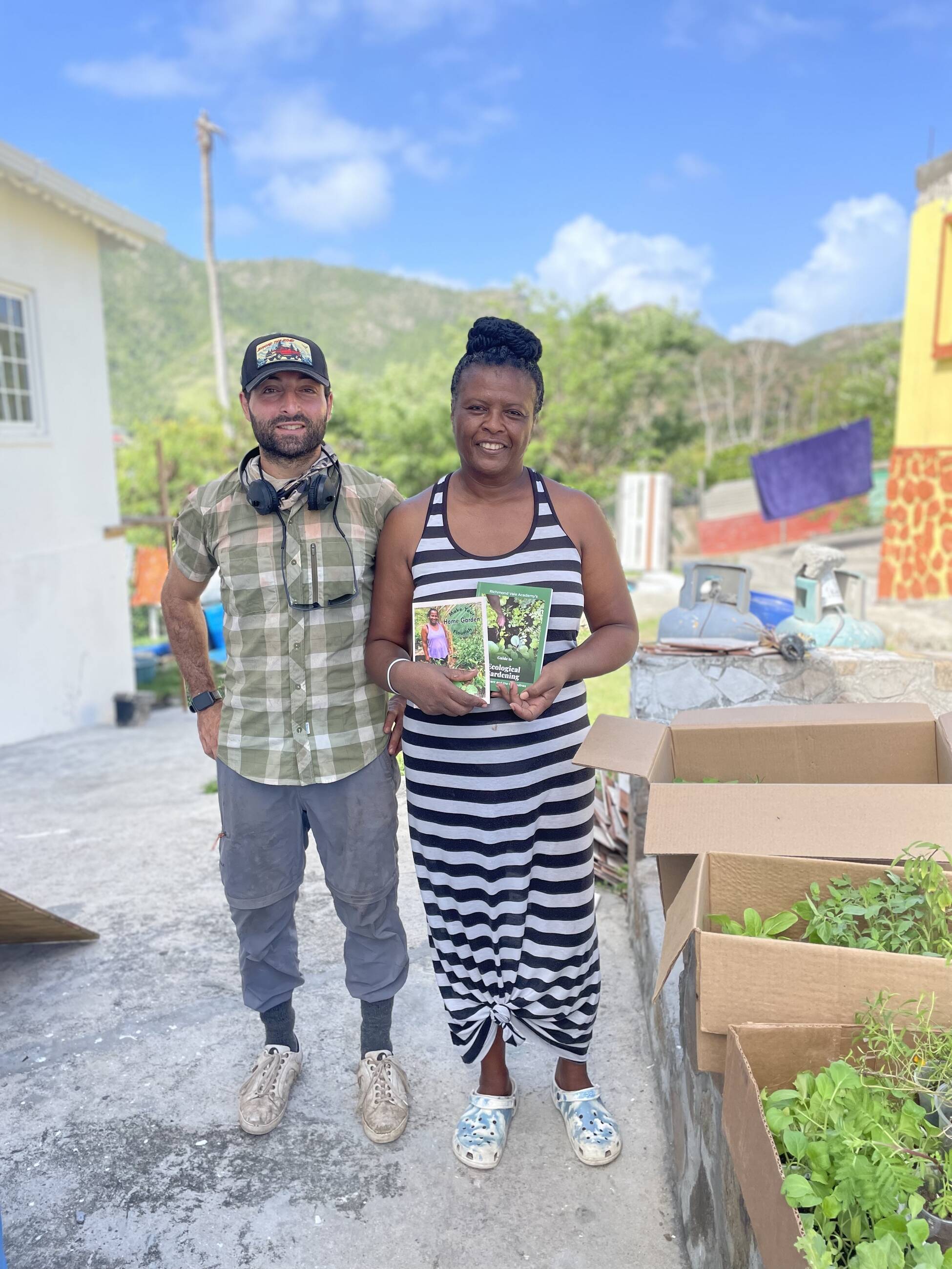 Assisting a local farmer with planting and garden setup