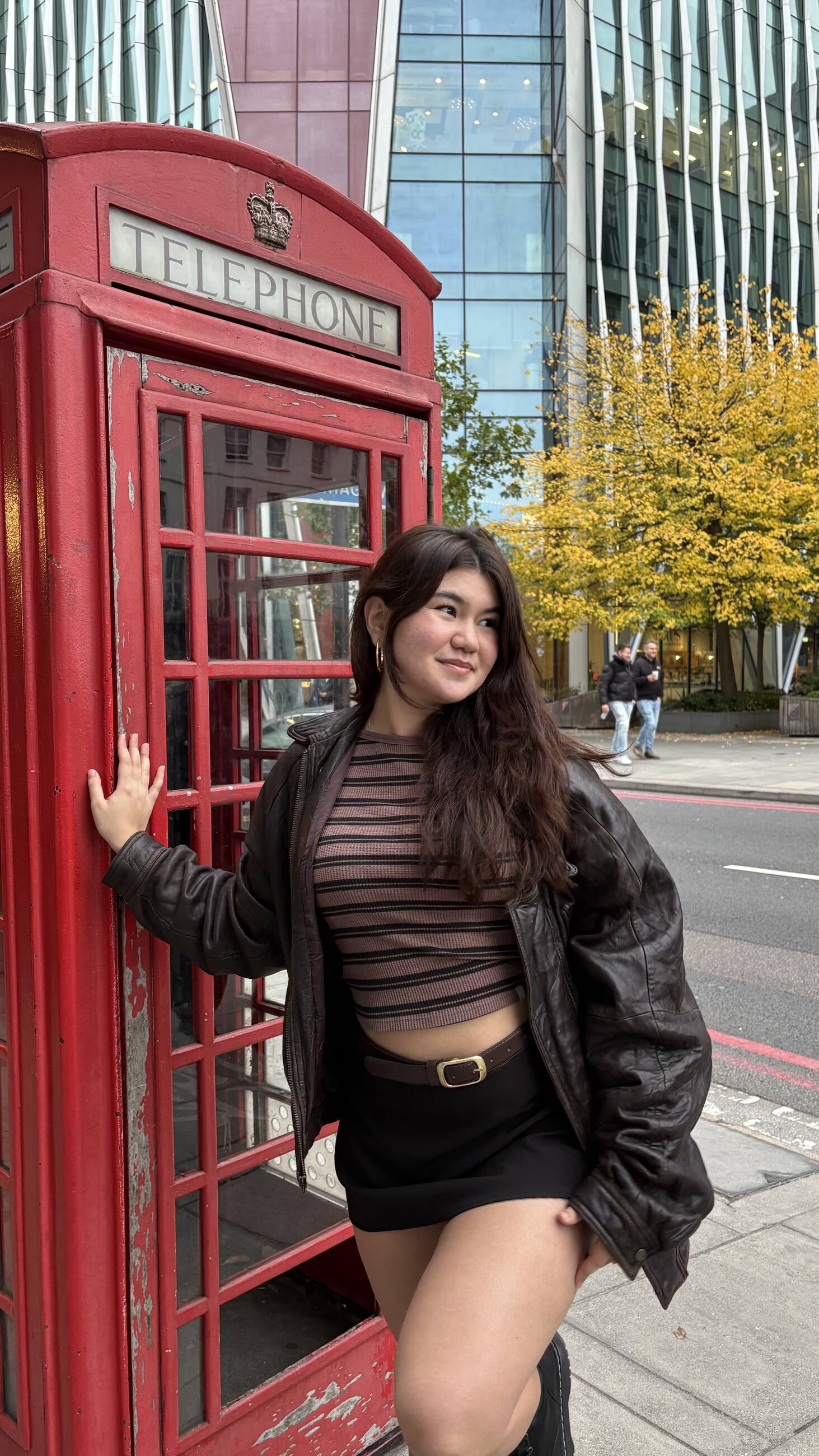 My roommate taking a picture of me after we aimlessly roamed around London. 