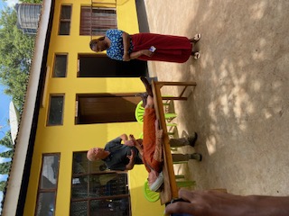 Helping the volunteer doctor to translate to the students