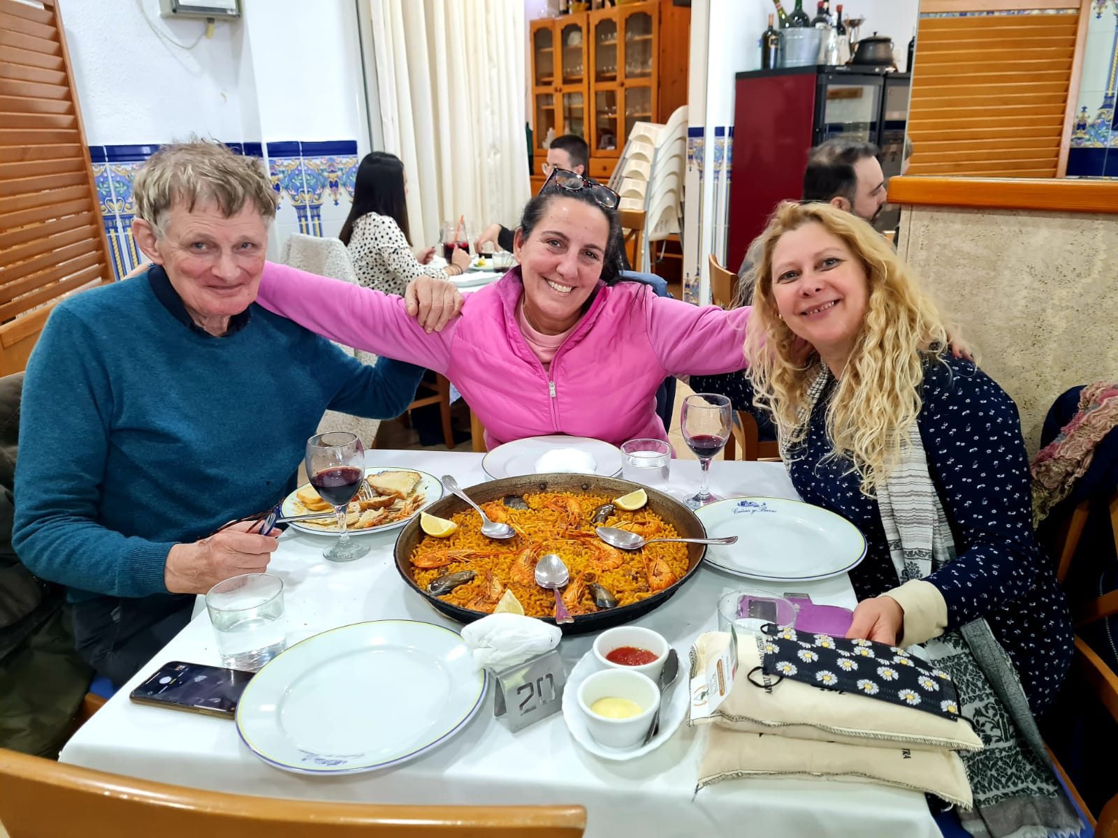 Sharing paella and laughter with Mónica and Pilar—Spain at its best