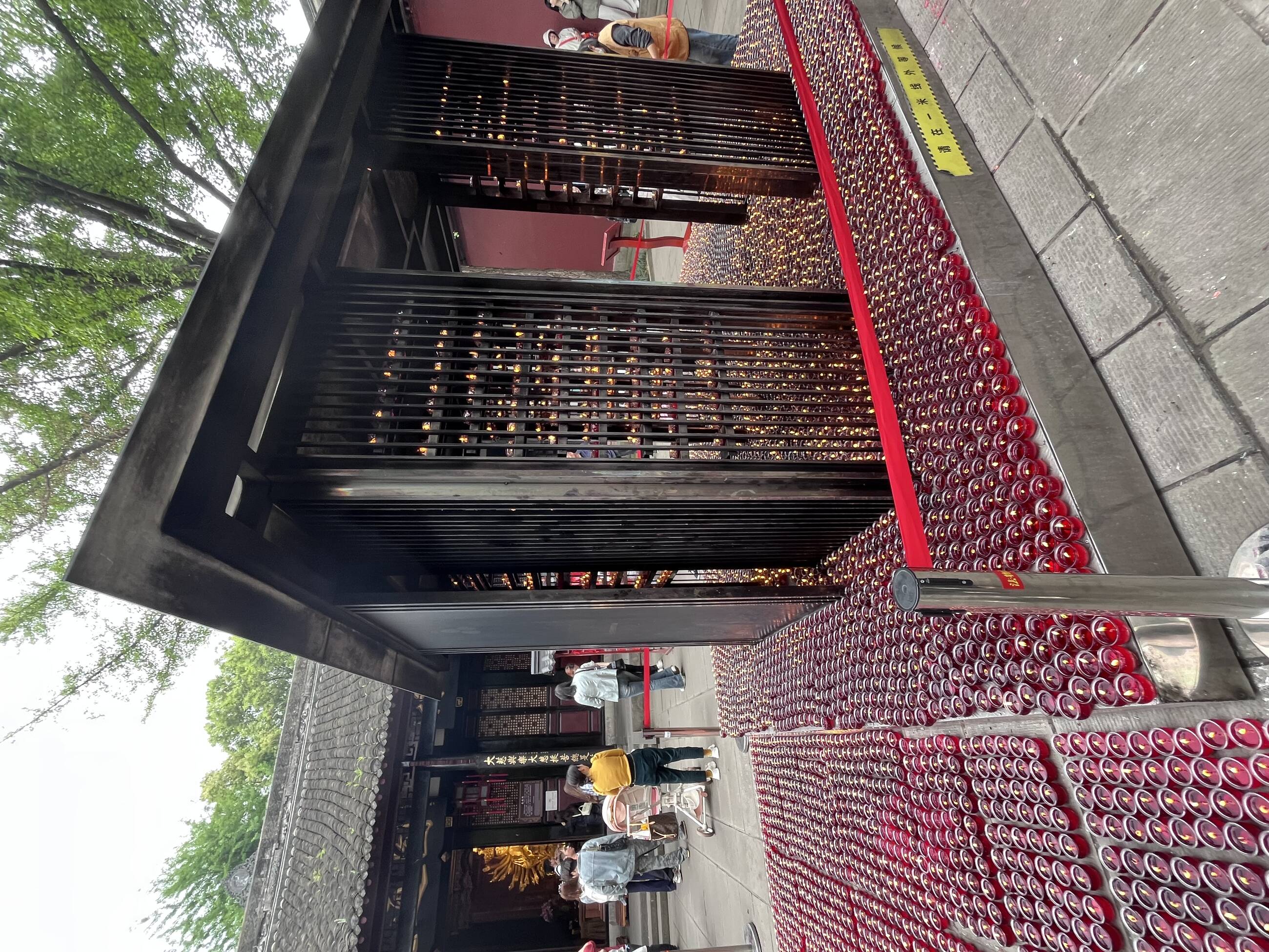 One of the most unforgettable moments of my experience in Chengdu was visiting a temple. The atmosphere there was incredibly peaceful and almost magical. There were so many candles everywhere, softly lighting up the space and creating a warm, golden glow that made everything feel calm and surreal. The combination of the traditional architecture, the quiet surroundings, and the flickering candlelight made the whole place feel truly beautiful and deeply meaningful. It was a moment that really stayed with me.