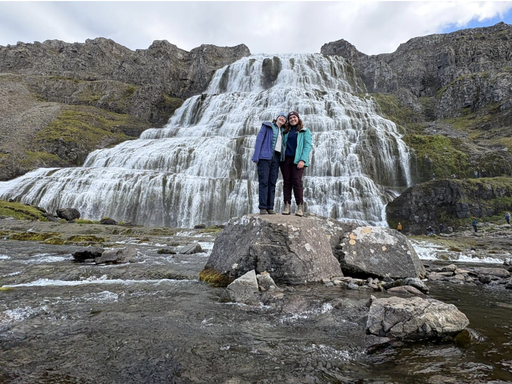 Two SIT students in front of Dynjandi, the largest waterfall in the Icelandic Westfjords