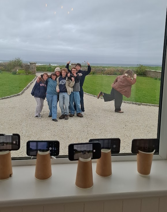 Taking one picture on seven different phones with homemade tripods :)