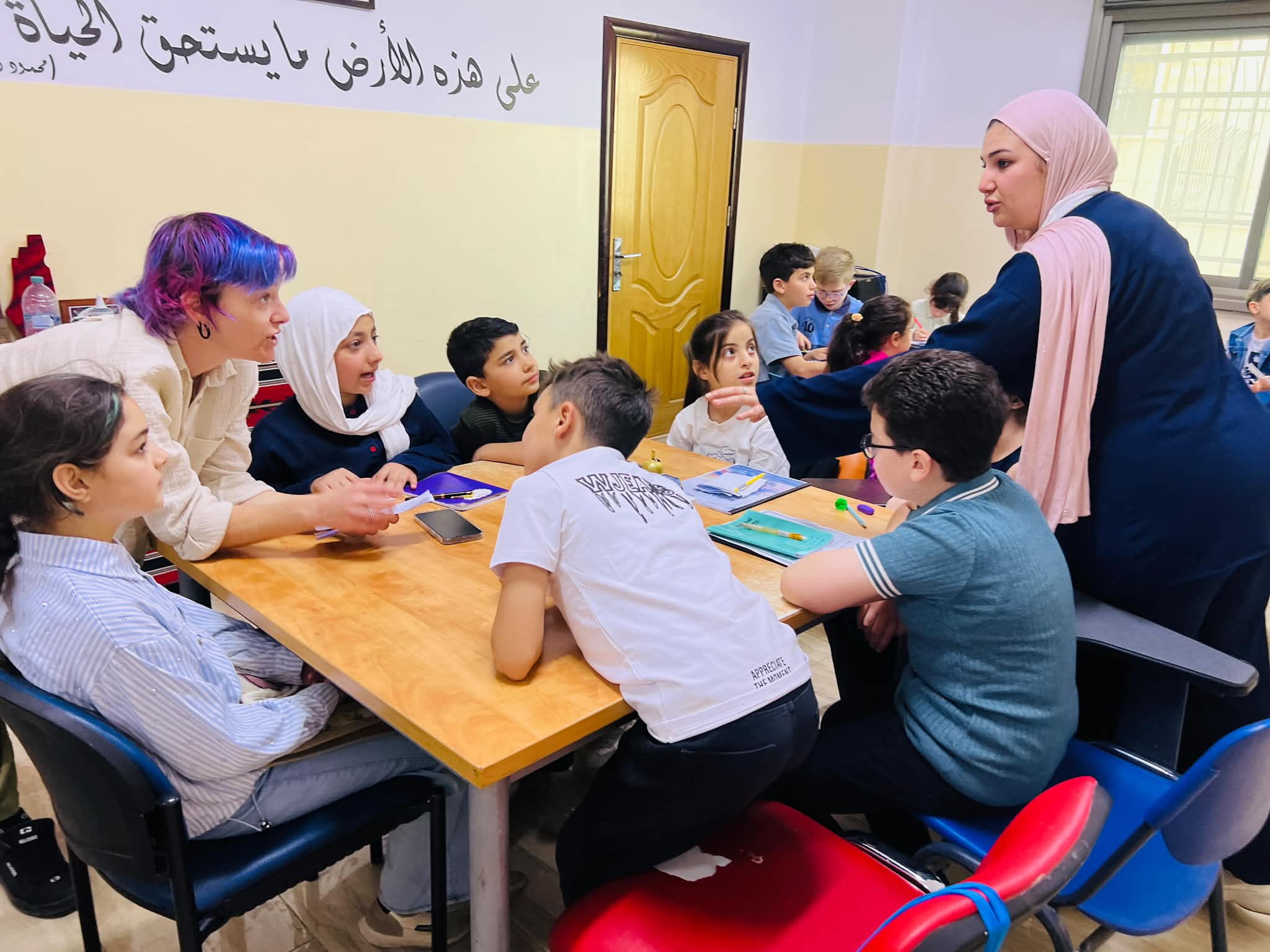 Joining Jomana's English class at the Excellence Center