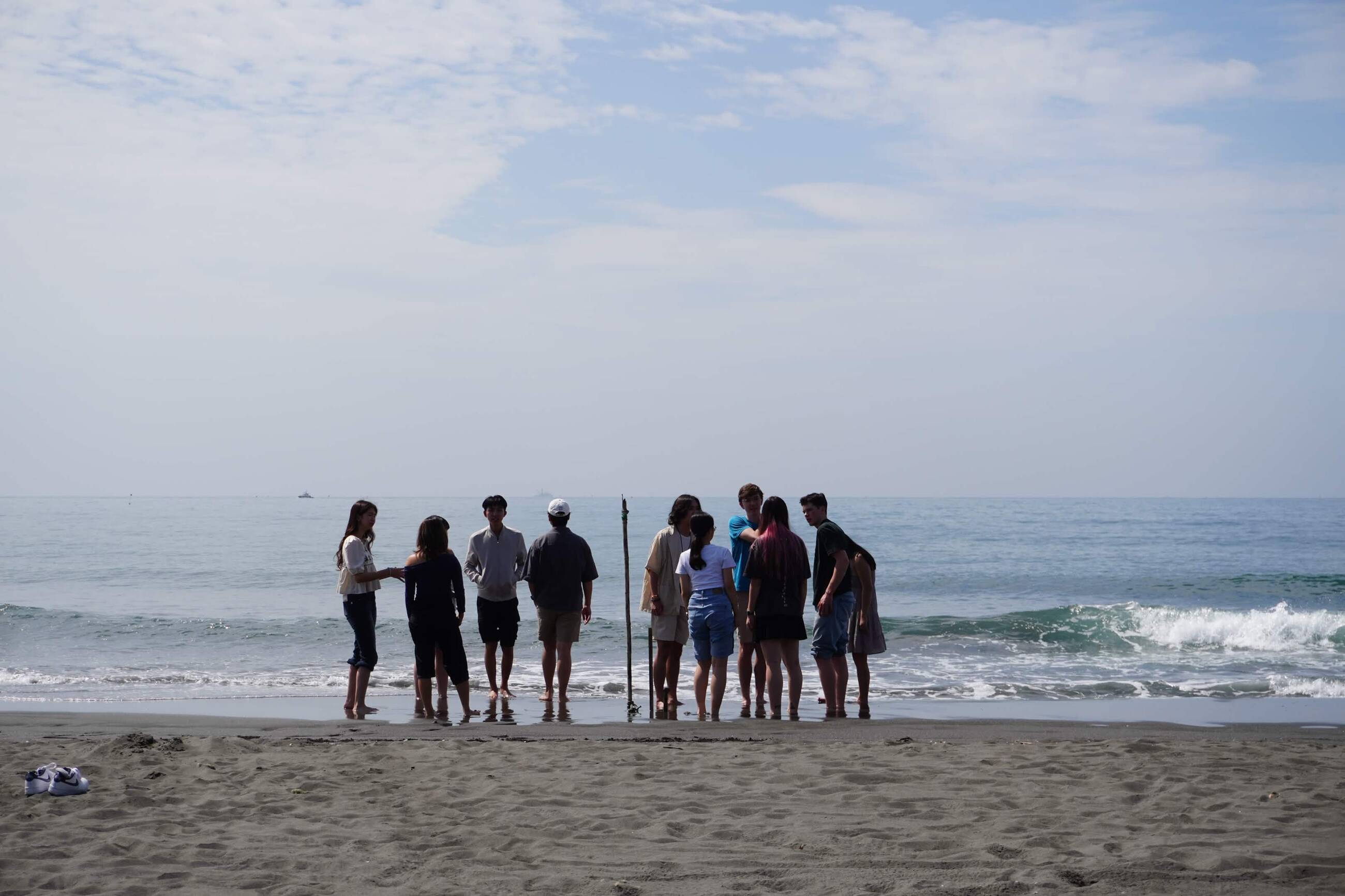 Enjoying the beach on campus with classmates