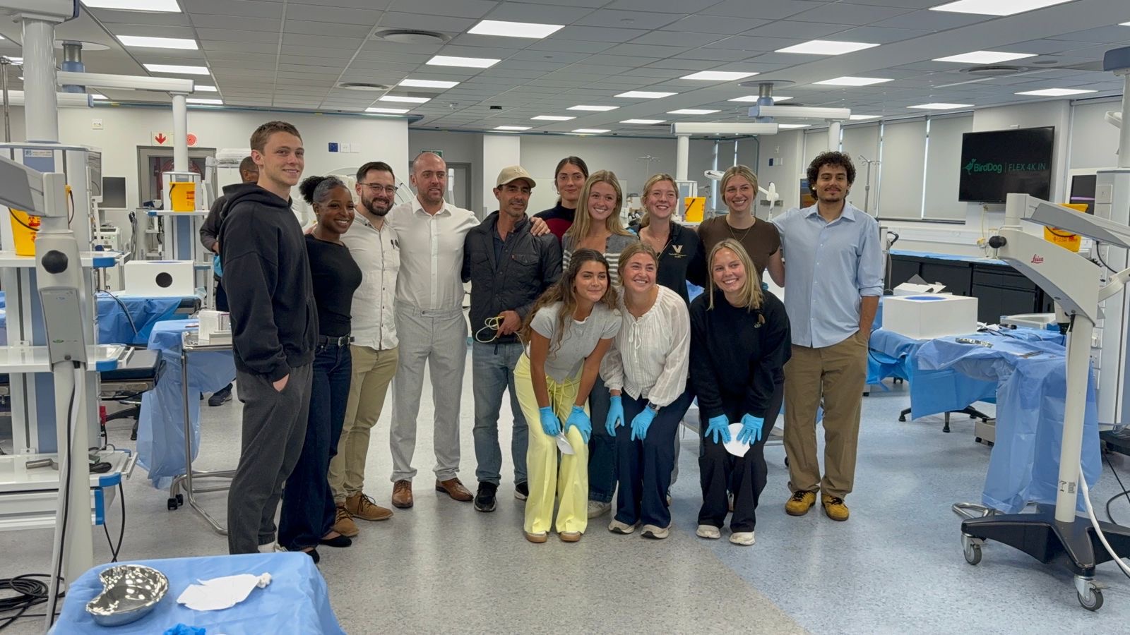 My cohort and I in a sun skills lab learning to suture and work with various surgical tools!