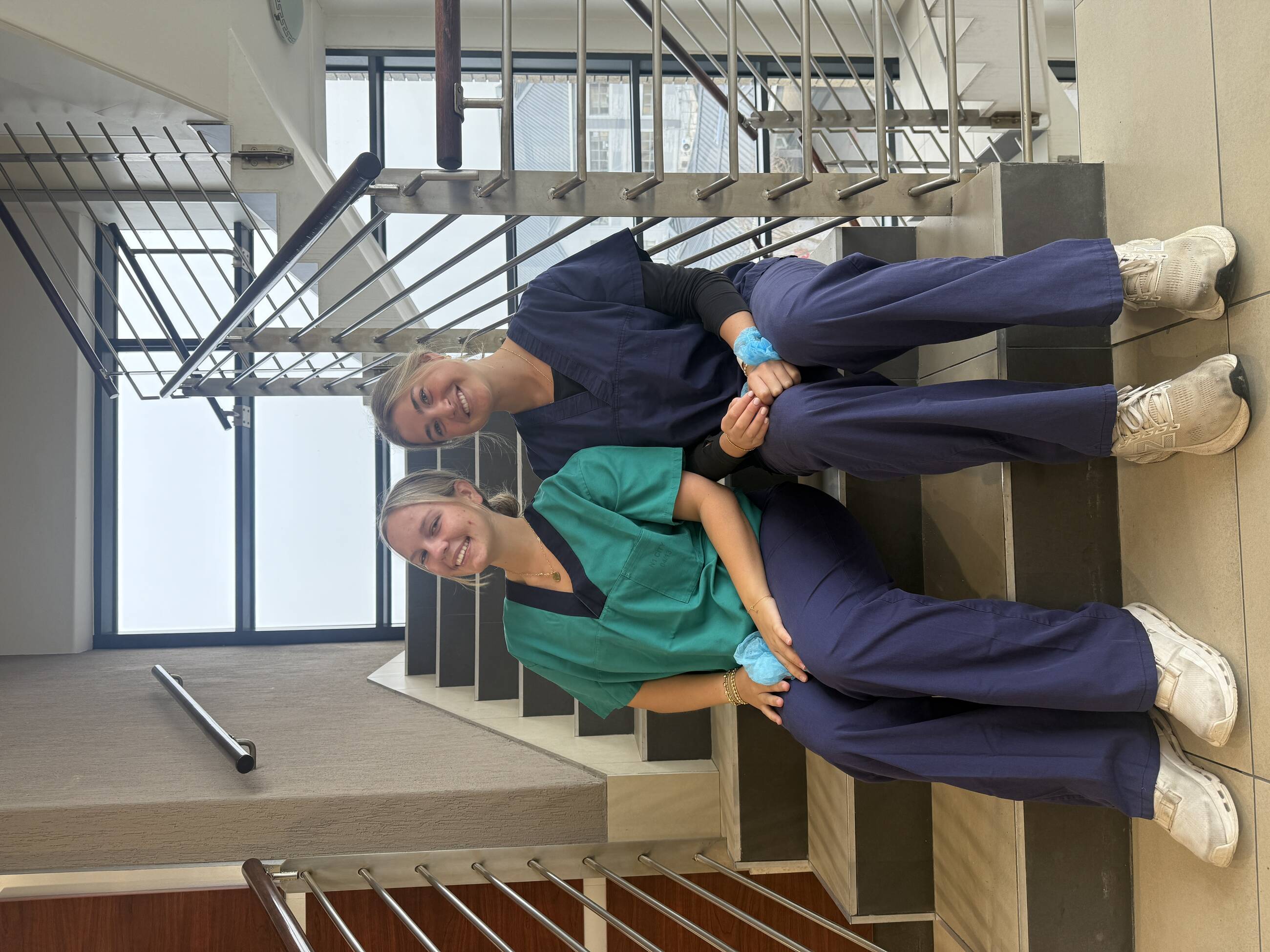My friend and I getting ready to sit in an operating room and observe a spinal fusion up close!
