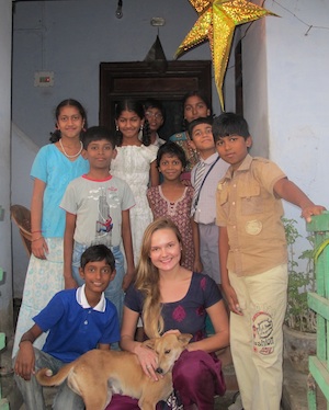 Woman with a group of children in India