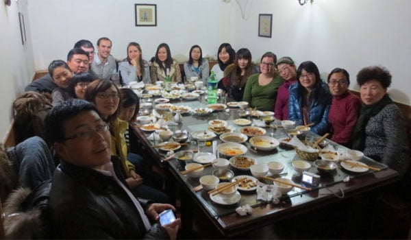 Laetitia with her colleagues at a goodbye dinner