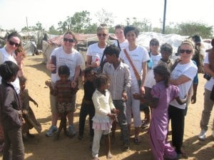 Quinn and fellow DWC India volunteers meeting local children