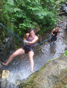 Volunteer climbs Ecuador waterfall