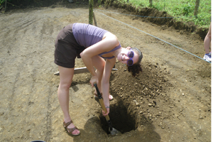 Volunteers digging holes in Ecuador