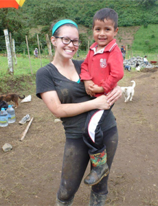 Volunteer with local kid from Ecuador