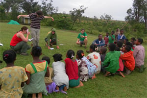 Volunteers play with kids in Madagascar