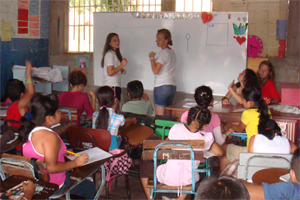 VISIONS volunteers teaching in classroom