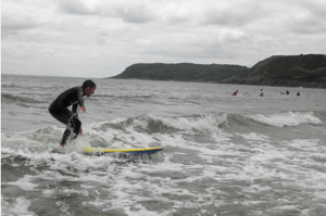 Peter surfing off the coast of the UK