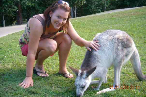 Sarah petting a kangaroo in Australia