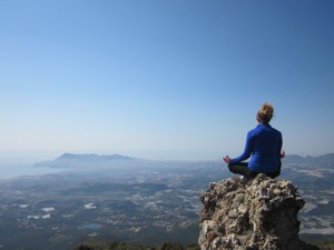 Jamie looking down on a beautiful landscape