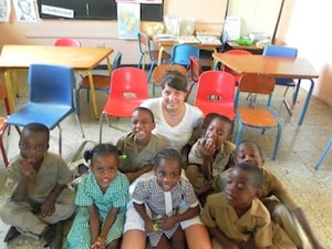 Woman with a classroom of kids