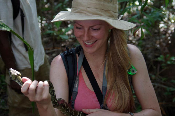 Frankie with a boa in Madagascar