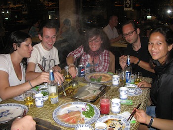 Hutong School students eating Chinese food