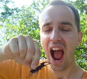 Man eating a scorpion