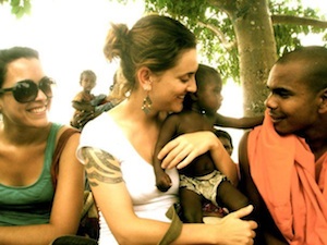 Woman holding a child in India