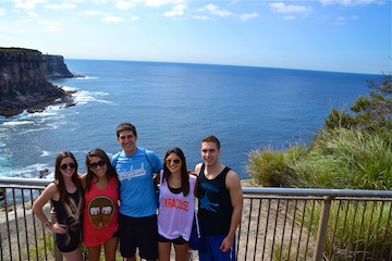 Kyle and friends in front of the beach in Australia!