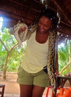 Asha holding a Burmese Boa