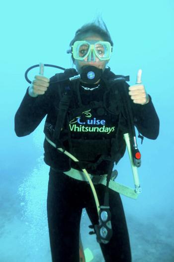 Jessica scuba diving! Thumbs up!