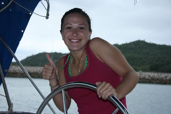 Theresa captaining a boat in Australia