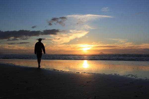 Aaron admiring a beach near Auckland