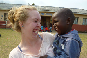 Jessica with local African child