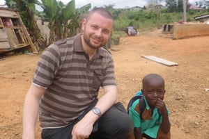 A volunteer with local child in Ghana
