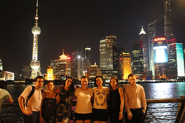 Justine and some of the Absolute Internship interns before the Pudong skyline