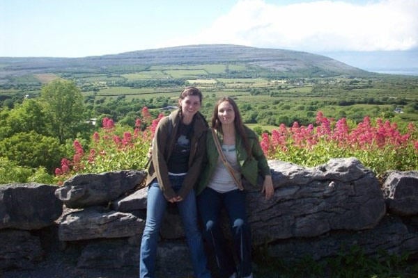 Caroline posing with the beautiful Irish landscape