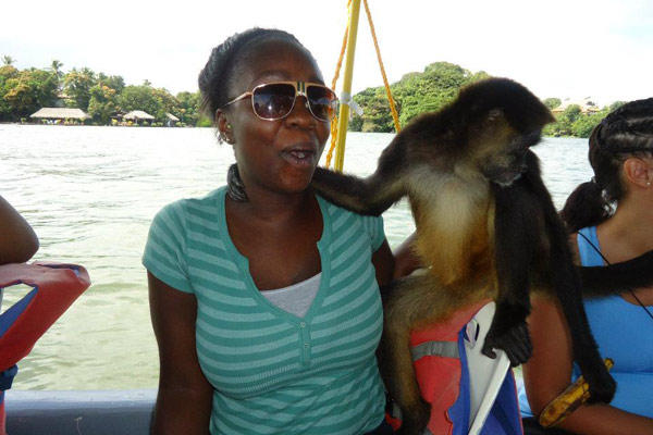 Johayne making a friend in Costa Rica! What's he holding in his left foot?