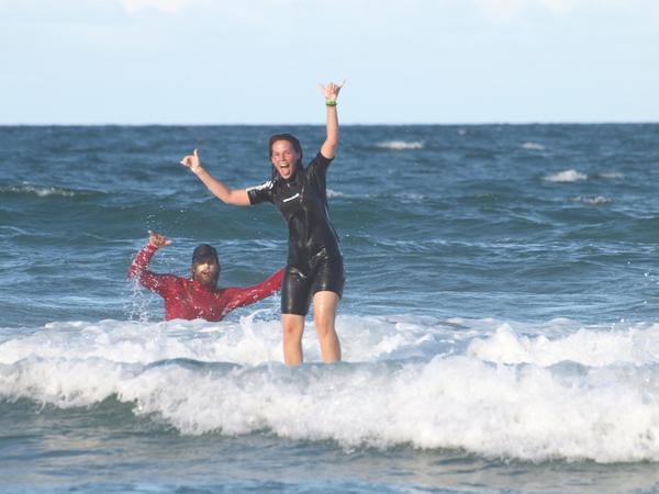 Chelsea surfing in the waters of Australia!