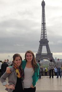 Alexis in front of the Eiffel Tower