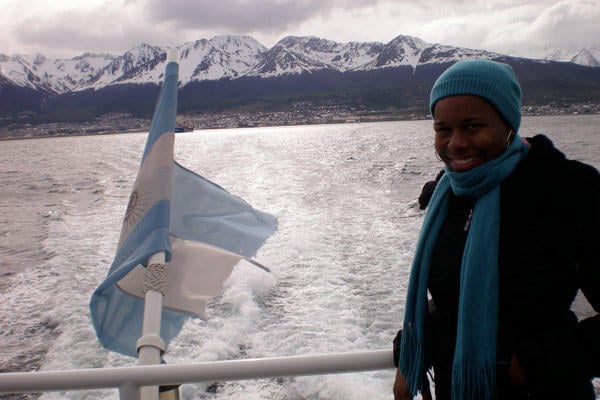Danielle on a boat ride in front of the Andes