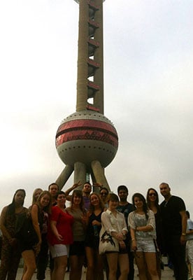 Friends in front of the Oriental Pearl Tower in Shanghai China