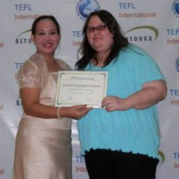 ITTT TEFL student receiving diploma