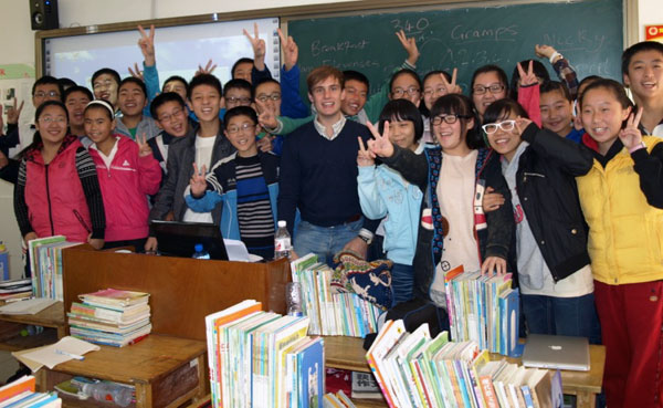 Nick teaching English to a group of Chinese students