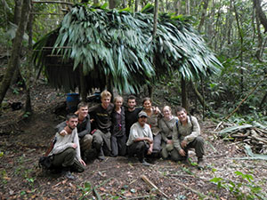 Gapforce participants under their made palapa