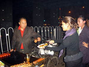 Eating Chinese street food at night